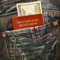 Russian passport and money in jeans pocket