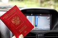 Russian passports and car Navigator in the background Royalty Free Stock Photo