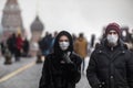 Russian people wear a medical mask walking on Red Square in Moscow during coronavirus COVID-19 epidemic in Russia Royalty Free Stock Photo