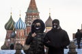Russian people wearing protective face mask walk on Red Square in Moscow