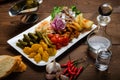 Russian pickle appetizer and carafe of vodka Royalty Free Stock Photo