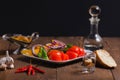 Russian pickle appetizer and carafe of vodka Royalty Free Stock Photo