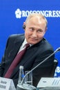 Russian President Vladimir Putin smiles