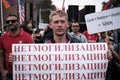 Russian protester with a poster against mobilization at a demonstration