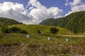 Russian region, Chechen Caucasus Mountains Wooden hives on a mountain apiary