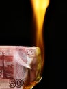 Russian rubles bills on fire