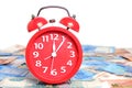 Russian rubles and red alarm clock white background.Time Russian ruble Royalty Free Stock Photo