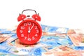 Russian rubles and red alarm clock white background.Time Russian ruble Royalty Free Stock Photo