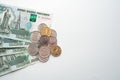 Russian rubles on a white background. Thousand notes and various coins. Place for text