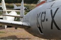Russian 1960`s fighters with faded military stencil graphic numbers at Chateau de Savigny near Beaune in Burgundy, France