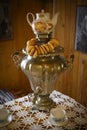 Russian samovar with porcelain cups, teapot and dryers