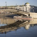 Russian scene: River trips on the Moscow river, view for the Vodootvodny canal in Moscow near Bolotnaya square at dusk Royalty Free Stock Photo