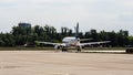 Russian short-haul narrow-body passenger aircraft Sukhoi Superjet 100 is taxiing to runway of Gromov Flight Research Institute