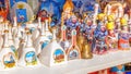 Russian souvenirs bells are sold with samaras on the market. Text in Russian: Samara, bell