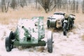 Russian Soviet 45mm Anti-tank Gun And Old Tricar, Three-Wheeled Motorbike. Main Anti-tank Weapon Of Red Army Artillery