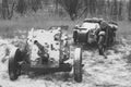 Russian Soviet 45mm Anti-tank Gun And Old Tricar, Three-Wheeled Motorbike. Main Anti-tank Weapon Of Red Army Artillery