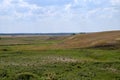 Russian steppe with ravines under rays of hot sun Royalty Free Stock Photo