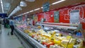 Russian supermarket chain. Wide range of products. Retail industry. Rows of shelves with fresh cheese. Organic food. Online delive