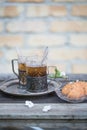 Russian Tea. Tea in a vintage glass outside on wooden table Royalty Free Stock Photo