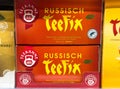 Russian teefix black tea packaging with bold red design and authentic branding Royalty Free Stock Photo