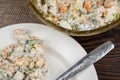 Russian traditional Olivier salad with vegetables and meat. Winter salad for New Year and Christmas. close-up, selective focus Royalty Free Stock Photo