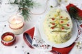 Russian traditional salad Olivier with vegetables, meat. Christmas season. Royalty Free Stock Photo