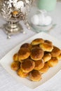 Russian traditional teaparty with samovar and pies or pirozhki with apple jam