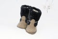 Russian traditional winter felt boot valenki on the snow Royalty Free Stock Photo