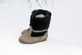 Russian traditional winter felt boot valenki on the snow Royalty Free Stock Photo