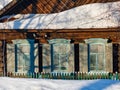 Russian traditional wooden house in winter. Village of Visim, Sverdlovsk region, Ural, Russia Royalty Free Stock Photo