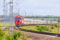 The Russian train travels by rail. Passenger train rides through the fields. Russian railway. locomotive. Russia, Anapa, July 16, Royalty Free Stock Photo