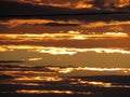 Sunset. parallel orange clouds. Royalty Free Stock Photo