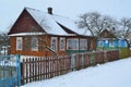 Russian village, Belarus. Winter snow village panorama. Natural wooden texture