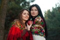 Russian village girls in headscarves in a dense forest Royalty Free Stock Photo