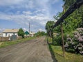Russian village, near the road passes the heating line in Kamen-na-Obi, Altai, Russia. View