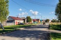 Russian village in summer. View of the village road with traditional wooden houses along the street. Visim, Russia Royalty Free Stock Photo