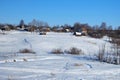 Russian village on a winter day Royalty Free Stock Photo