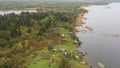 Village with wooden old houses on an island in Lake Onega, in autumn in Karelia Russia