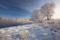 Russian Winter. Morning Frosty Winter Landscape With Dazzling White Snow And Hoarfrost,River And Saturated Blue Sky.