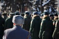 Russian Winter. A soldier with a bayonet in a karakul cap