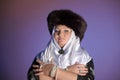 Russian woman in a fur hat, white scarf and with pearls Royalty Free Stock Photo