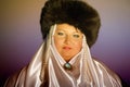 Russian woman in a fur hat, white scarf and with pearls Royalty Free Stock Photo