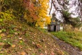 Russian wooden church in the autumn park. Manor of Arkhangelsk