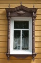 Russian wooden window in Tomsk, Russia. Old house. Historic building. Royalty Free Stock Photo