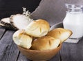 Russians traditional pastries - pies on a dark wooden background