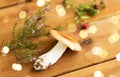 Russule mushroom with heather on wooden background