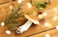 Russule mushroom with heather on wooden background Royalty Free Stock Photo