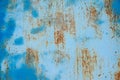 Rust on the blue painted metal surface. Background, structure. Royalty Free Stock Photo