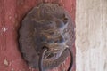 Rust Bronze door knocker in the shape of a lion head Royalty Free Stock Photo