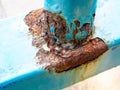 Rust and corrosion at weld joint.